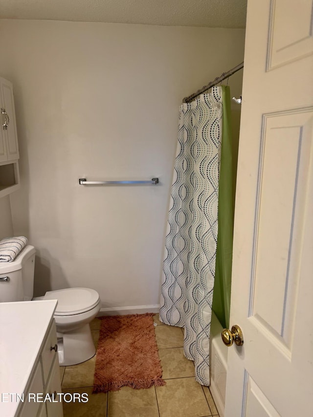 7925 Eldin Way, Powell, TN 37849 - bathroom with vanity, shower / bath combo with shower curtain, and tile patterned flooring