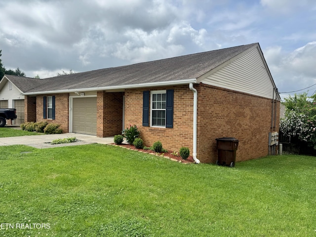 7925 Eldin Way, Powell, TN 37849 - ranch-style home with concrete driveway, brick siding, a garage, and a front lawn