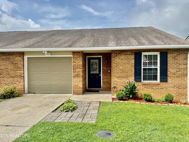 7925 Eldin Way, Powell, TN 37849 - view of front of house with brick siding and a shingled roof
