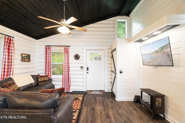 1065 Shell Mountain Rd, Sevierville, TN 37876 - living room with wooden ceiling, lofted ceiling, dark wood-style flooring, a wood stove, and ceiling fan