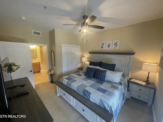 527 River Place Way Unit 516, Sevierville, TN 37862 - bedroom featuring light colored carpet, a closet, ceiling fan, and ensuite bath