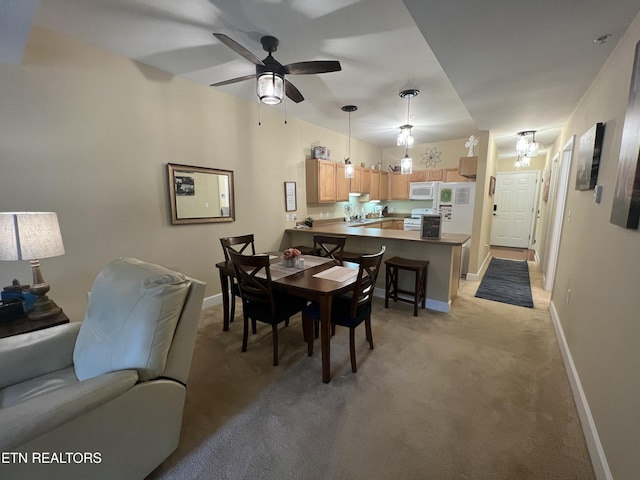 527 River Place Way Unit 516, Sevierville, TN 37862 - dining space with light carpet and ceiling fan