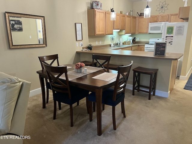 527 River Place Way Unit 516, Sevierville, TN 37862 - dining space featuring light carpet and baseboards