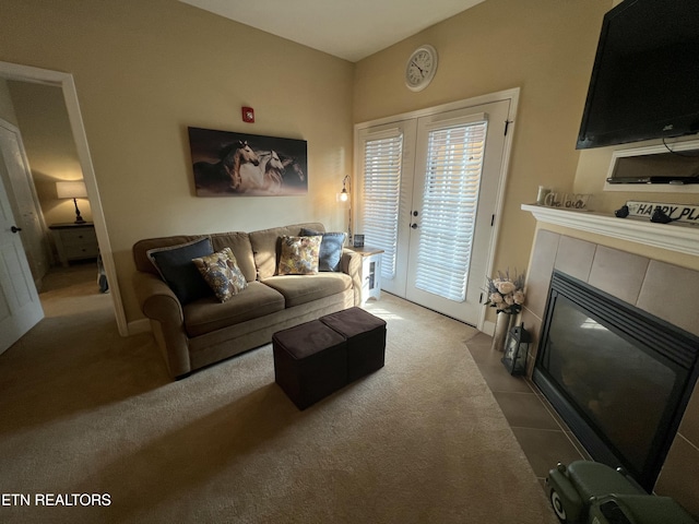 527 River Place Way Unit 516, Sevierville, TN 37862 - living room with carpet, french doors, and a tile fireplace