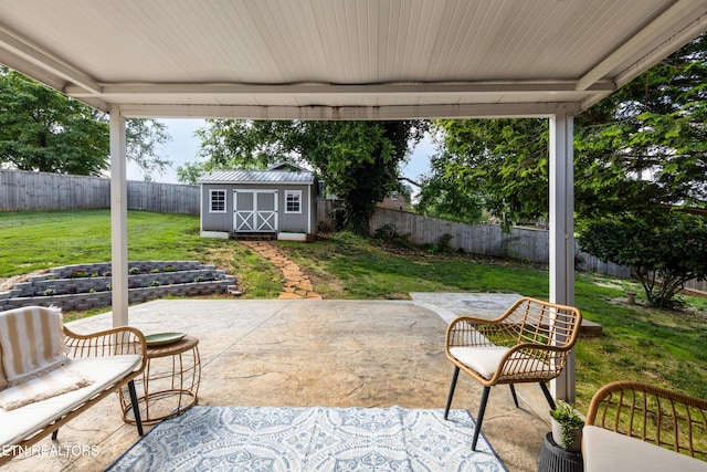 4313 Midview Ln, Knoxville, TN 37938 - fenced backyard featuring a patio area and a storage shed
