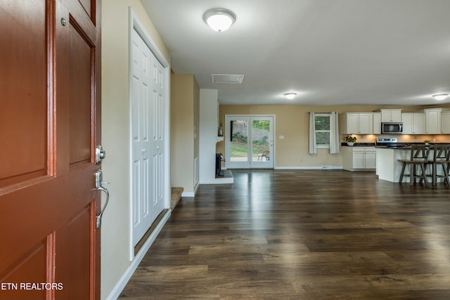 4313 Midview Ln, Knoxville, TN 37938 - foyer entrance featuring dark wood-style flooring and baseboards