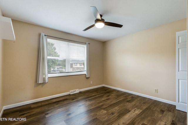 4313 Midview Ln, Knoxville, TN 37938 - empty room with dark wood-type flooring and ceiling fan