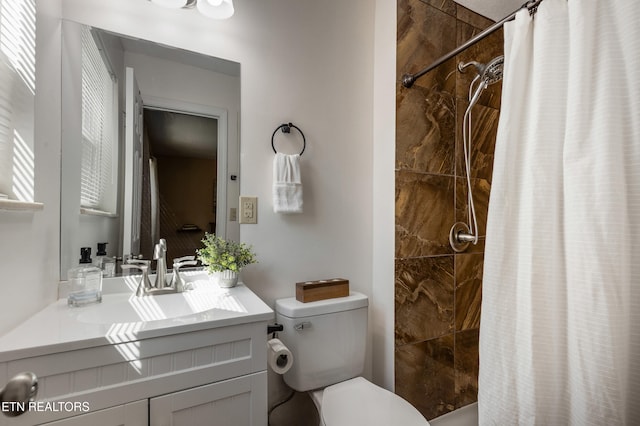4313 Midview Ln, Knoxville, TN 37938 - bathroom featuring vanity and a tile shower