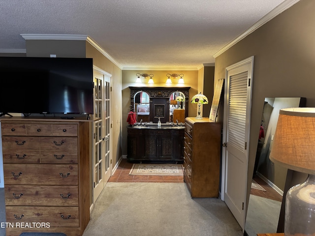 281 Red Williams Rd, Crossville, TN 38555 - kitchen with a textured ceiling, crown molding, and light carpet