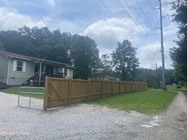 1843 Tazewell Pike, Corryton, TN 37721 - view of front of house with a gate and covered porch