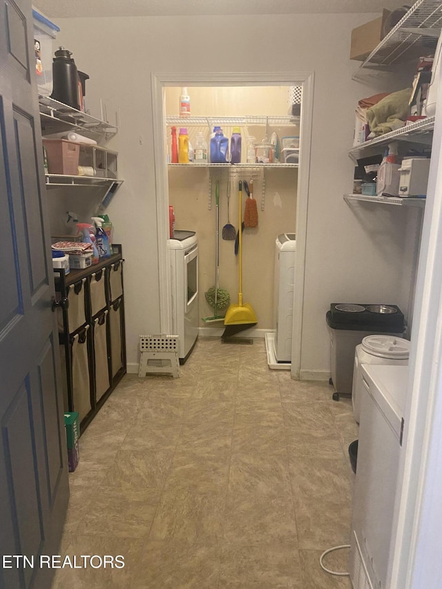 1843 Tazewell Pike, Corryton, TN 37721 - laundry room with washing machine and clothes dryer and light flooring