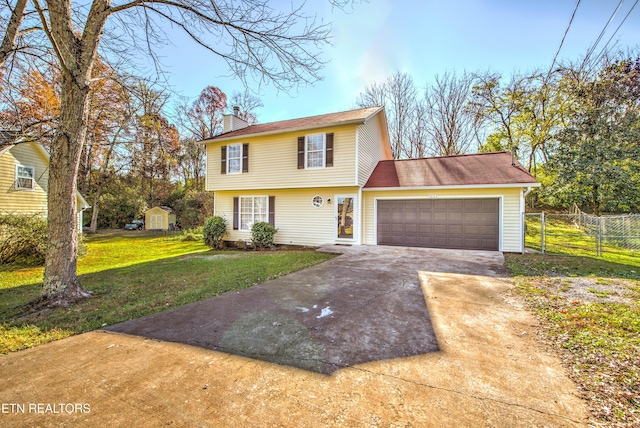 4004 Abercorn Rd, Knoxville, TN 37921 - colonial-style house featuring a chimney, driveway, a garage, and a storage unit
