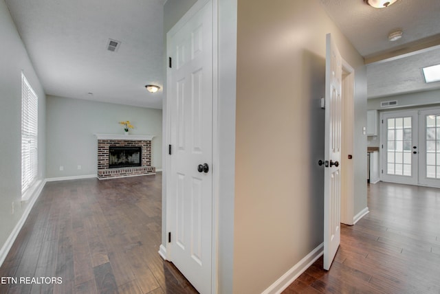4004 Abercorn Rd, Knoxville, TN 37921 - hall featuring dark wood-type flooring, french doors, and a textured ceiling
