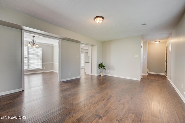 4004 Abercorn Rd, Knoxville, TN 37921 - unfurnished room featuring dark wood-style flooring and a chandelier
