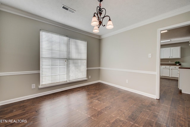 4004 Abercorn Rd, Knoxville, TN 37921 - spare room featuring a chandelier, crown molding, dark wood-style floors, and a textured ceiling