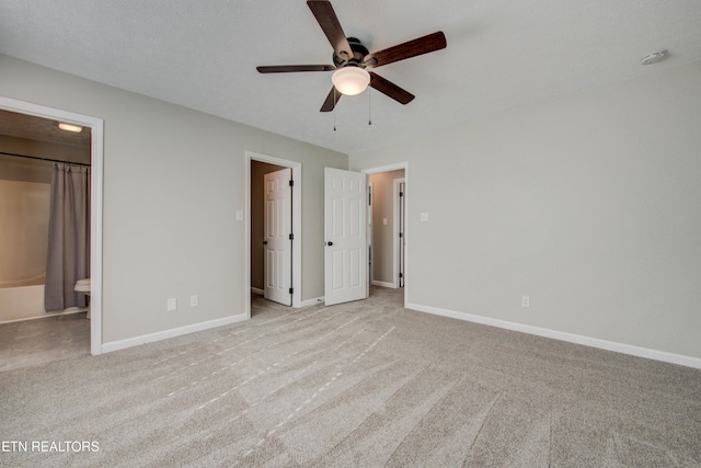 4004 Abercorn Rd, Knoxville, TN 37921 - unfurnished bedroom with carpet floors, ensuite bathroom, and a ceiling fan