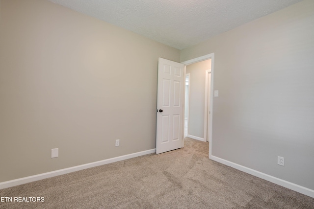 4004 Abercorn Rd, Knoxville, TN 37921 - unfurnished room with light carpet and a textured ceiling