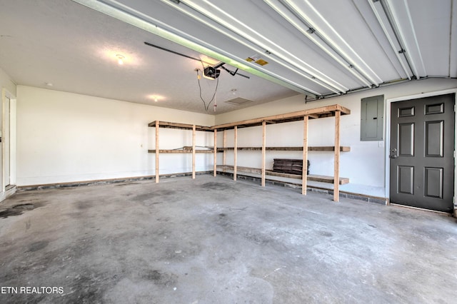 4004 Abercorn Rd, Knoxville, TN 37921 - garage with electric panel and a garage door opener