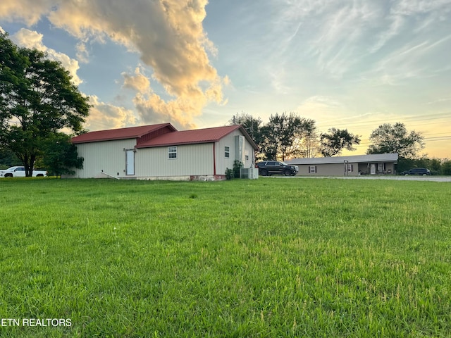 5521 S York Hwy, Grimsley, TN 38565 - view of property exterior featuring a metal roof and a yard