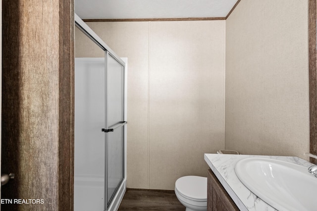 750 Bethlehem Rd, Lafollette, TN 37766 - full bathroom featuring a stall shower, wood finished floors, and vanity