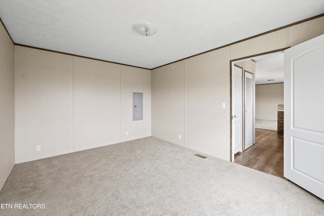 750 Bethlehem Rd, Lafollette, TN 37766 - empty room with electric panel, carpet floors, and ornamental molding
