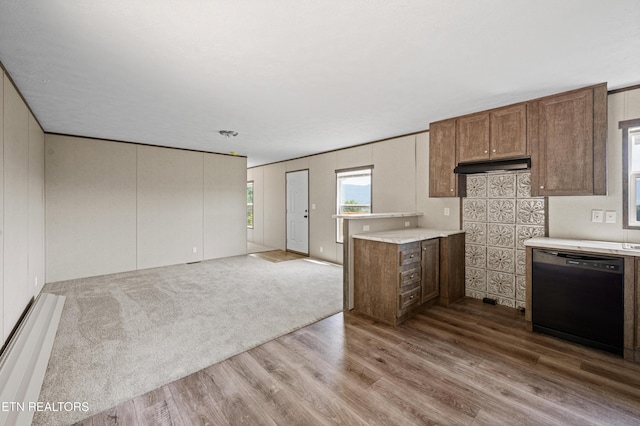 750 Bethlehem Rd, Lafollette, TN 37766 - kitchen with black dishwasher, wood finished floors, light countertops, and open floor plan