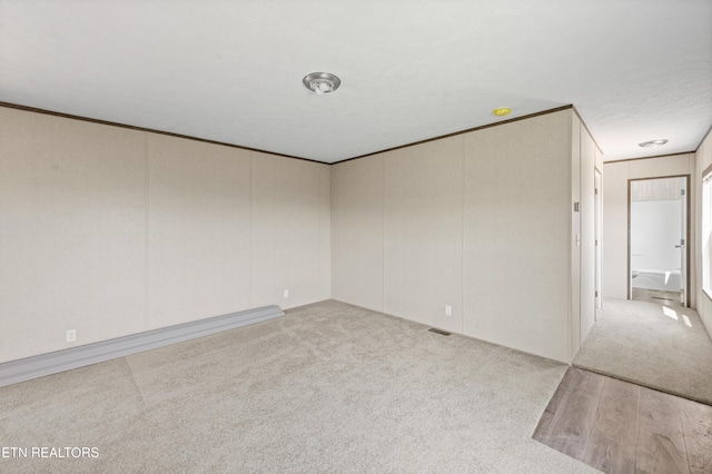 750 Bethlehem Rd, Lafollette, TN 37766 - spare room featuring carpet floors and wood finished floors