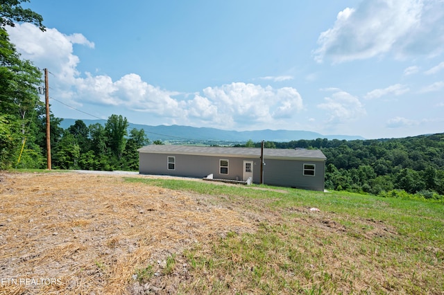 750 Bethlehem Rd, Lafollette, TN 37766 - rear view of property featuring a mountain view and a view of trees