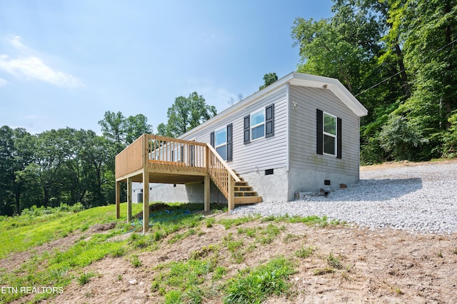 750 Bethlehem Rd, Lafollette, TN 37766 - rear view of house with a deck, crawl space, and stairs