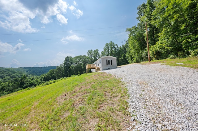 750 Bethlehem Rd, Lafollette, TN 37766 - view of yard with a deck and a view of trees