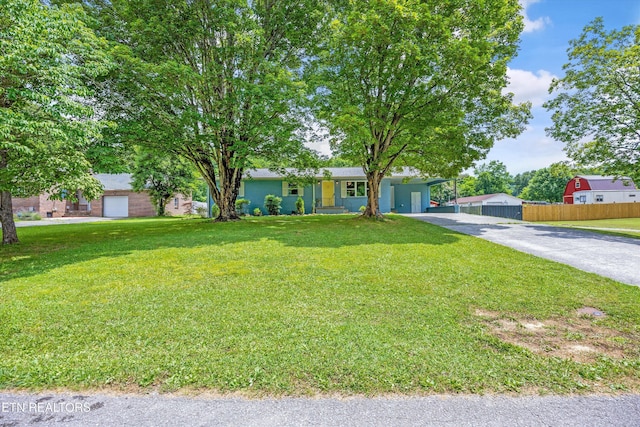 3408 Hackberry Rd, Knoxville, TN 37931 - view of front facade featuring driveway and an attached carport