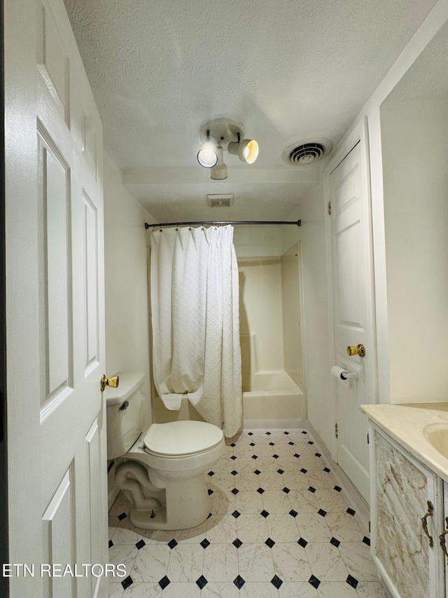 160 Clevenger Cut Off Rd, Newport, TN 37821 - bathroom with vanity, tile patterned floors, shower / bath combo with shower curtain, and a textured ceiling