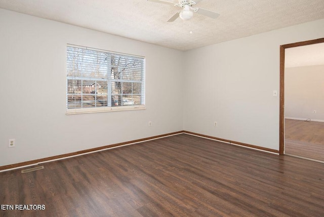 517 Bowman Bend Rd, Harriman, TN 37748 - empty room with a ceiling fan, wood finished floors, and a textured ceiling