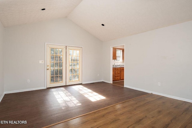 517 Bowman Bend Rd, Harriman, TN 37748 - empty room with dark wood-style floors and high vaulted ceiling