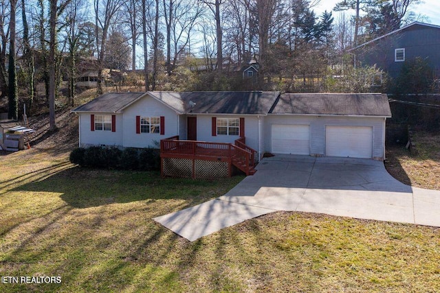 517 Bowman Bend Rd, Harriman, TN 37748 - single story home featuring a garage, concrete driveway, and a front lawn