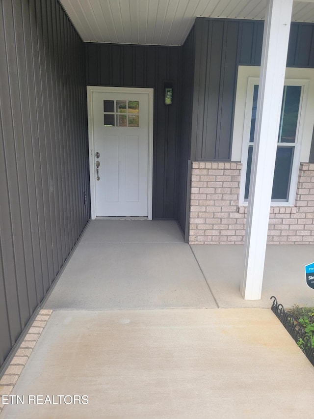 840 Granby Rd, Kingsport, TN 37660 - property entrance with brick siding and board and batten siding