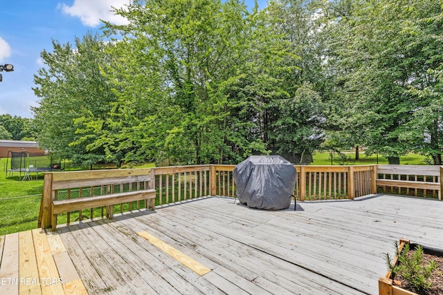 3123 Valemont Dr, Maryville, TN 37803 - wooden terrace with a trampoline, area for grilling, and a lawn
