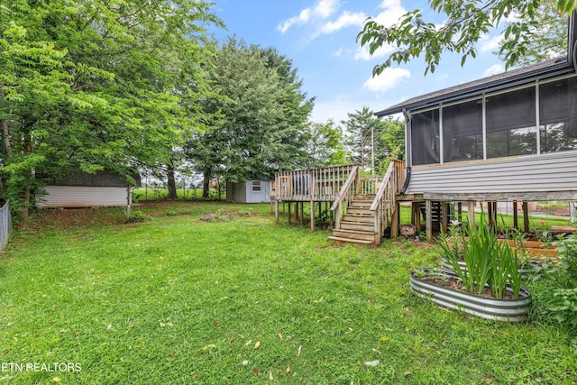 3123 Valemont Dr, Maryville, TN 37803 - view of green lawn featuring a storage unit, a sunroom, stairs, and a deck