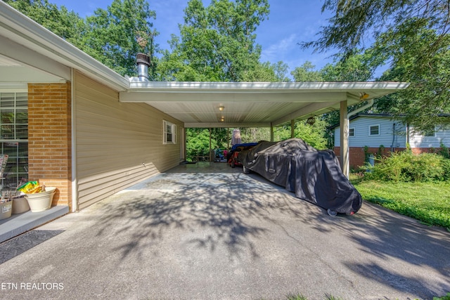 109 Wedgewood Rd, Oak Ridge, TN 37830 - view of parking / parking lot featuring asphalt driveway and a carport