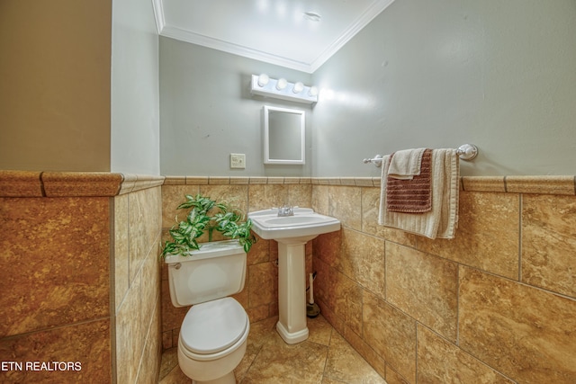 109 Wedgewood Rd, Oak Ridge, TN 37830 - half bathroom with tile walls, ornamental molding, and wainscoting