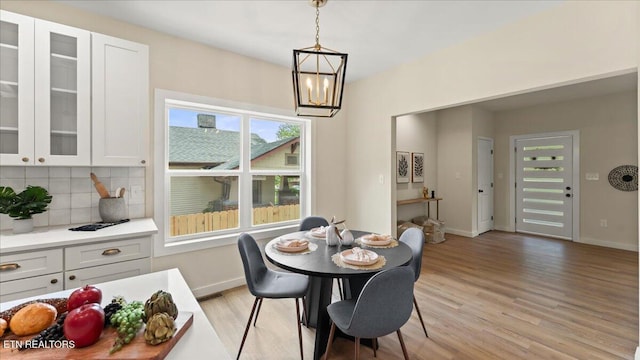 130 S Van Gilder St, Knoxville, TN 37915 - dining area with light wood-style flooring and a chandelier