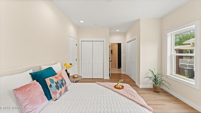 130 S Van Gilder St, Knoxville, TN 37915 - bedroom featuring light wood-style flooring, two closets, and recessed lighting