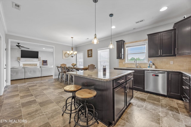 2679 Brooke Willow Blvd, Knoxville, TN 37932 - kitchen with dishwasher, a kitchen breakfast bar, decorative backsplash, dark brown cabinets, and light stone counters