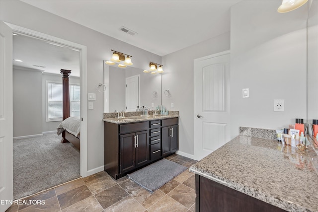 2679 Brooke Willow Blvd, Knoxville, TN 37932 - full bath featuring double vanity, stone finish floors, and connected bathroom