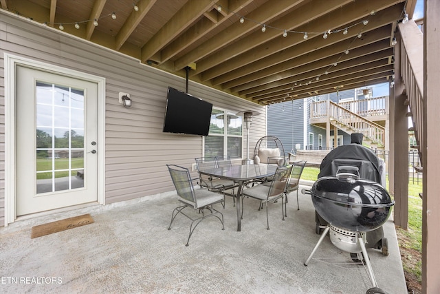 2679 Brooke Willow Blvd, Knoxville, TN 37932 - view of patio featuring stairway, outdoor dining area, and grilling area