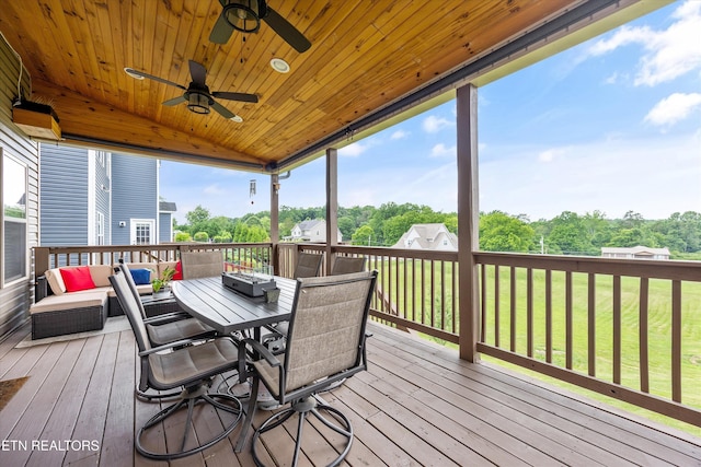 2679 Brooke Willow Blvd, Knoxville, TN 37932 - wooden terrace featuring ceiling fan, a yard, outdoor dining area, view of wooded area, and outdoor lounge area