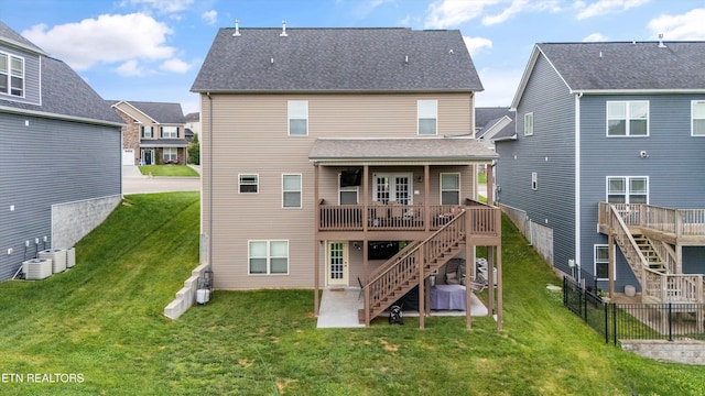 2679 Brooke Willow Blvd, Knoxville, TN 37932 - back of house featuring stairway, a wooden deck, a patio, and a shingled roof