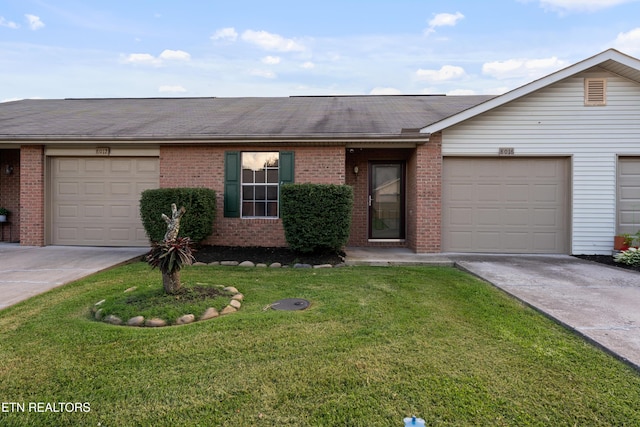 8016 Stablegate Way, Powell, TN 37849 - single story home featuring brick siding, driveway, roof with shingles, a front lawn, and a garage