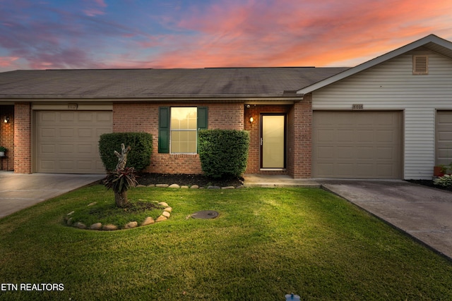 8016 Stablegate Way, Powell, TN 37849 - ranch-style house featuring concrete driveway, brick siding, and a garage