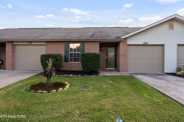 8016 Stablegate Way, Powell, TN 37849 - single story home with brick siding, driveway, roof with shingles, a front yard, and a garage